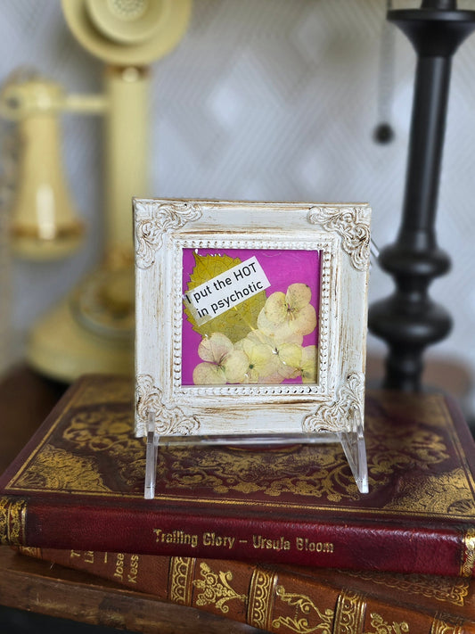 Framed Painted Canvas Featuring Pressed Flowers and "I Put The Hot In Psychotic"